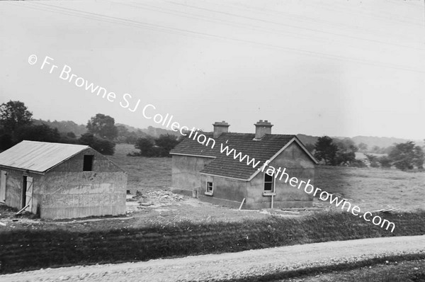 VIEW OF HOUSE AND COUNTRYSIDE FROM TRAIN